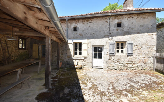 Discover the authentic charm of this semi-detached stone village house